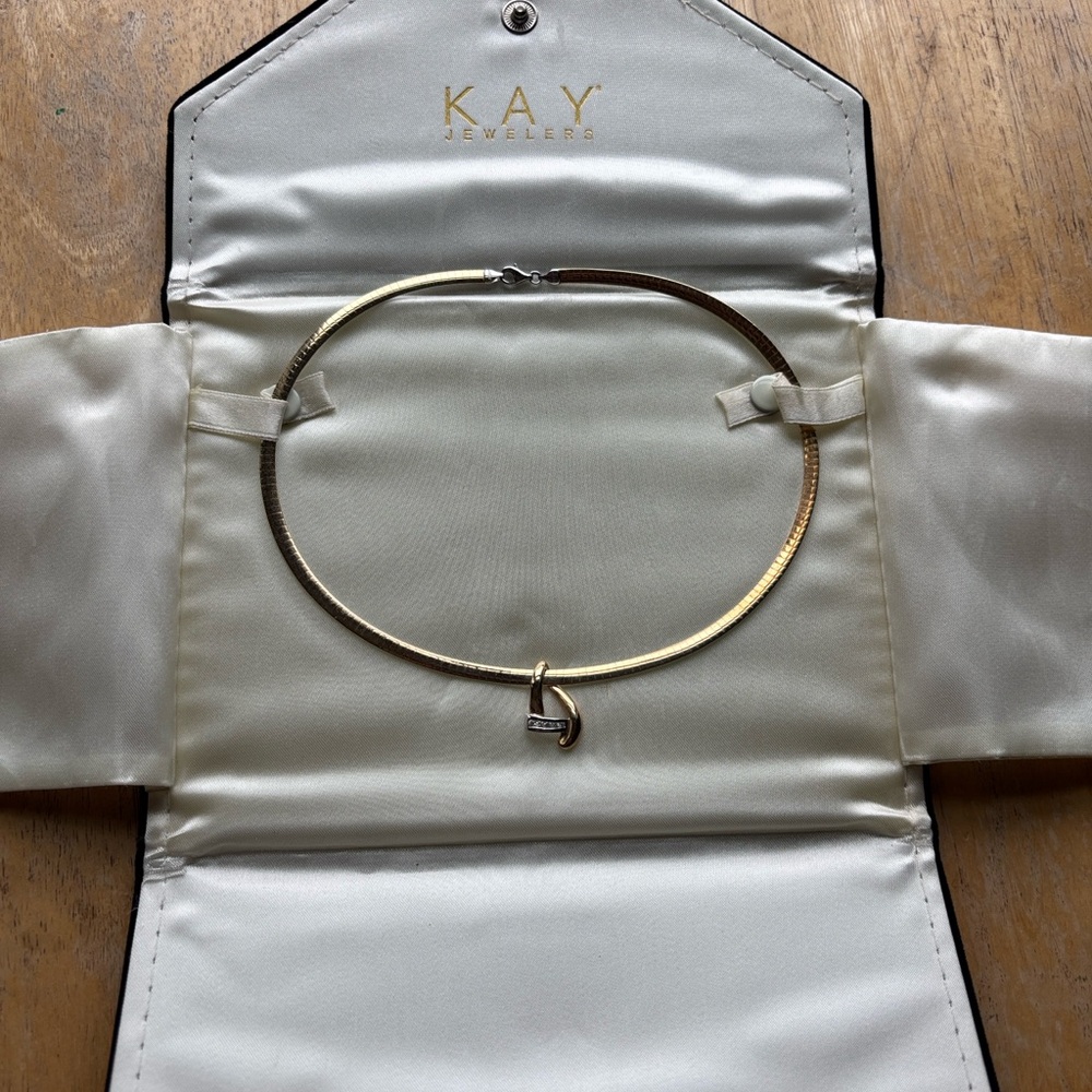 Kay Jewelers 10k gold necklace with a heart-shaped slide pendant.